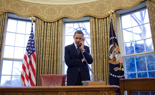 president barack obama on phone with president dmitry medvedev of russia in the oval office