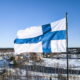 Aerial view of Finnish flag on the tower of Town Hall in Joensuu